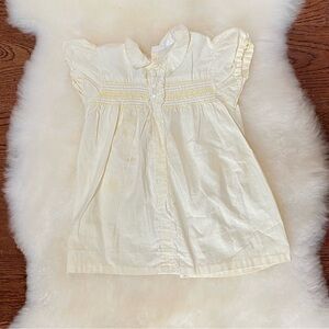 Vintage yellow smocked lace dress.